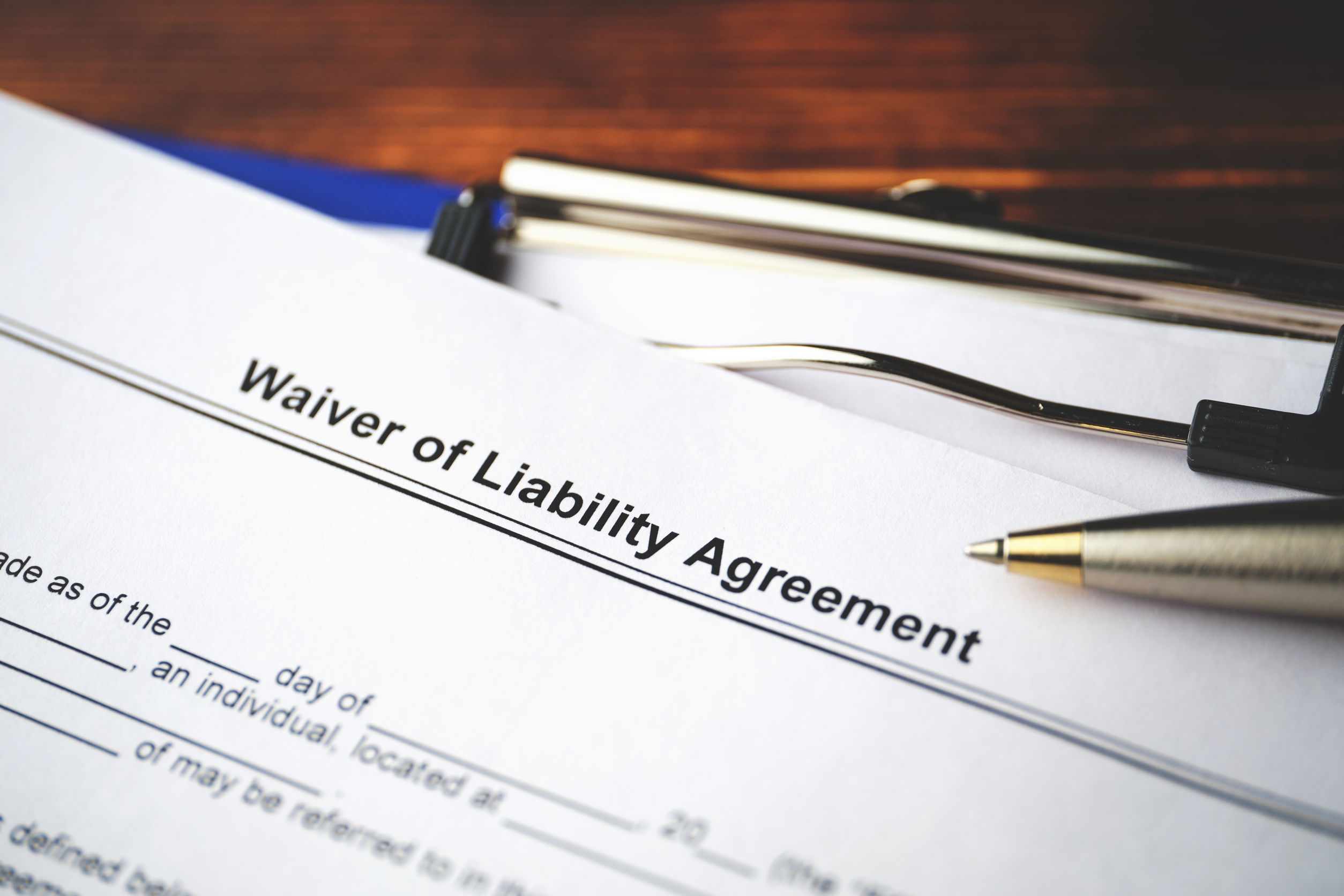 Legal document Waiver of Liability Agreement on paper close up.